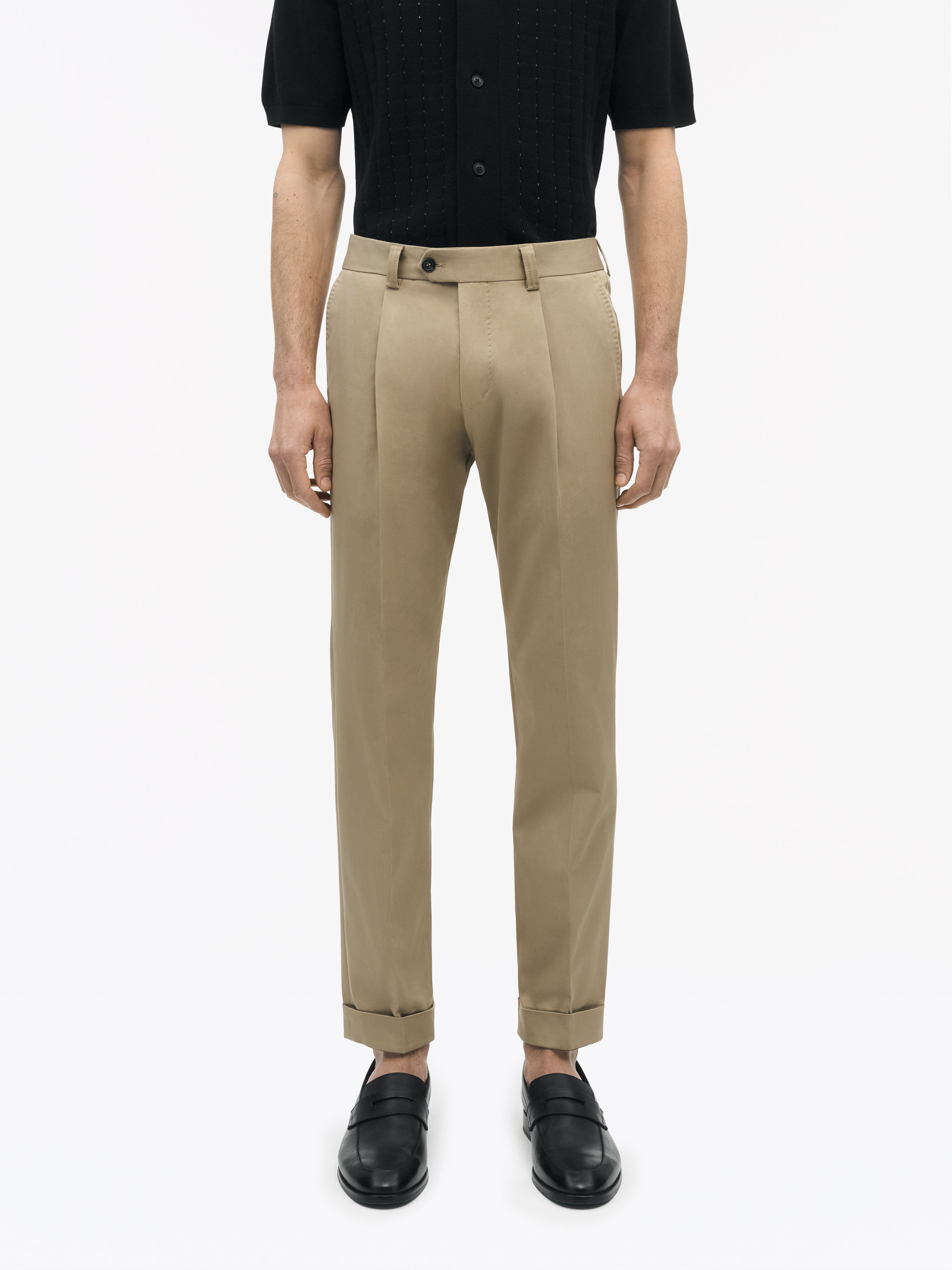 Man in beige chinos